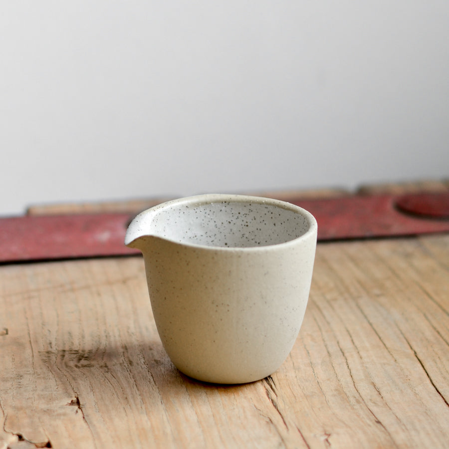 Handmade ceramic pourer ~ White on Stone